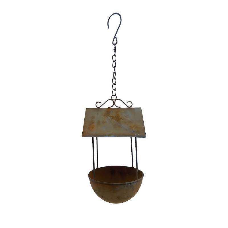Hanging birdhouse made of iron in rust look
