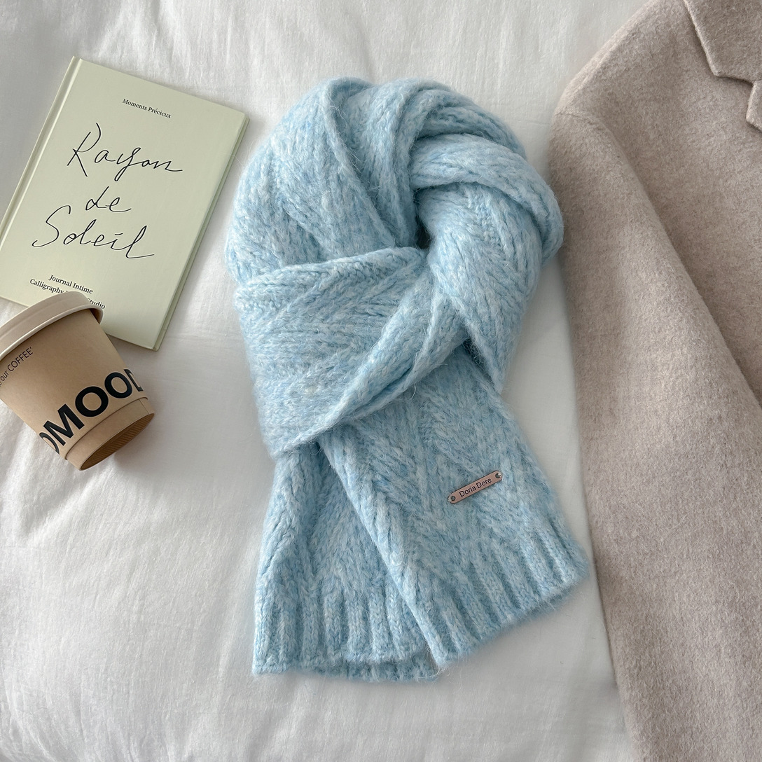 Knitted scarf made from wool blend with alpaca content