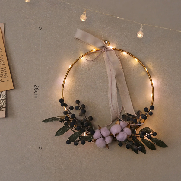 Illuminated Christmas wreath with LED light chain