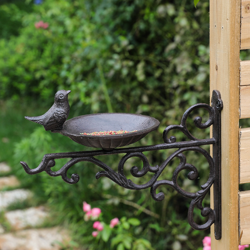 Decorative wall-mounted birdbath made of cast iron in European style