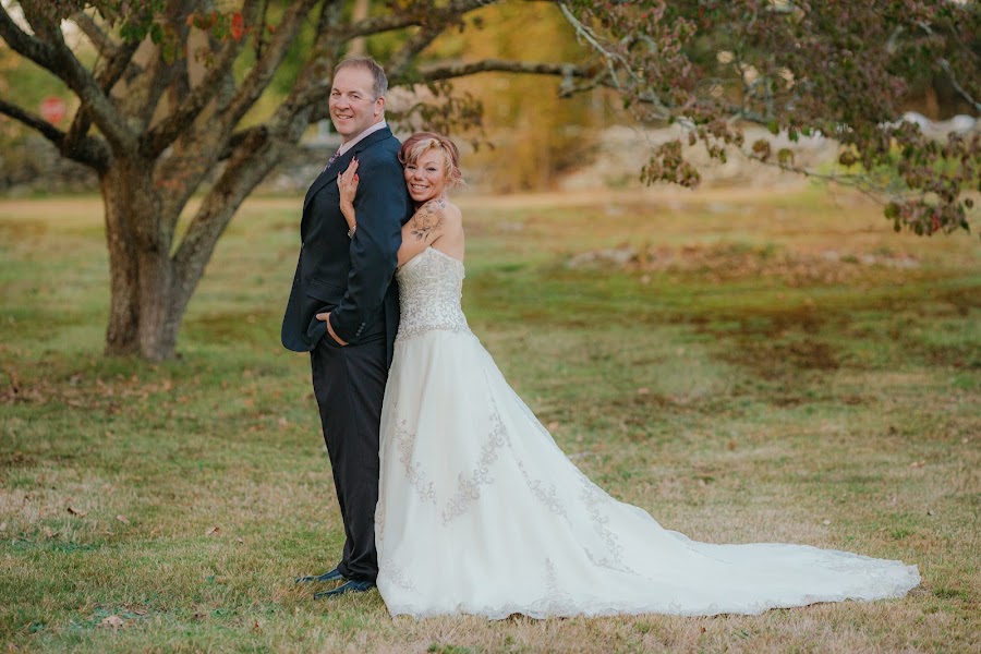 Couple portrait in golden-hour meadow light