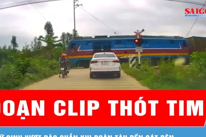 Thót tim cảnh 2 nữ sinh vượt rào chắn đường sắt trước đoàn tàu đang tới - Báo Sài Gòn Giải Phóng