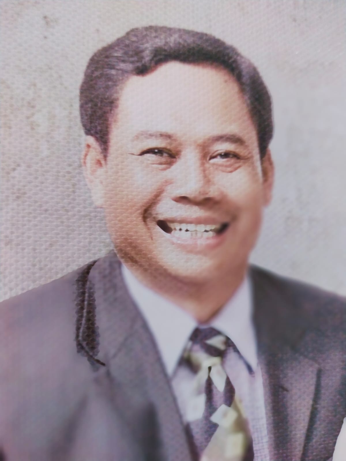 Toni, S.IP., M.Si.