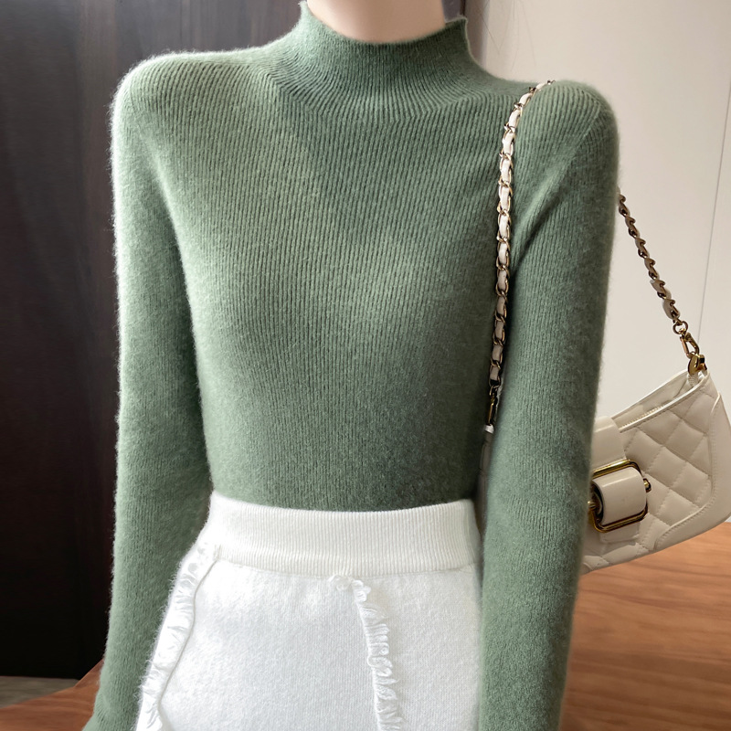 Women's knitted sweater with a standing collar, figure-hugging