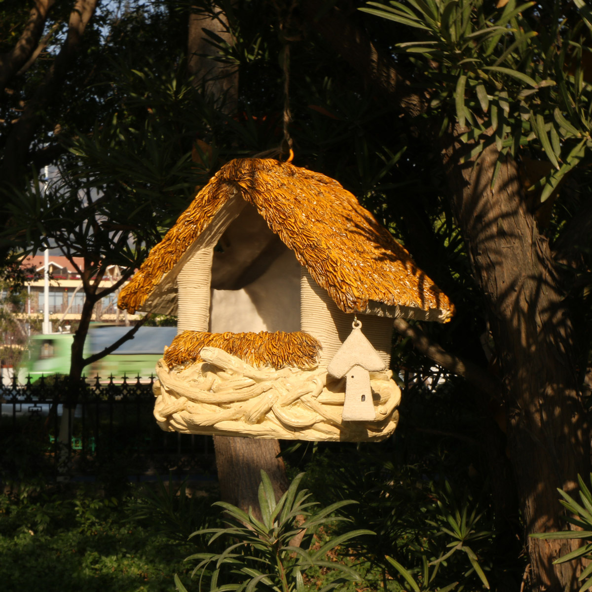 Decorative birdhouse hangers for the garden