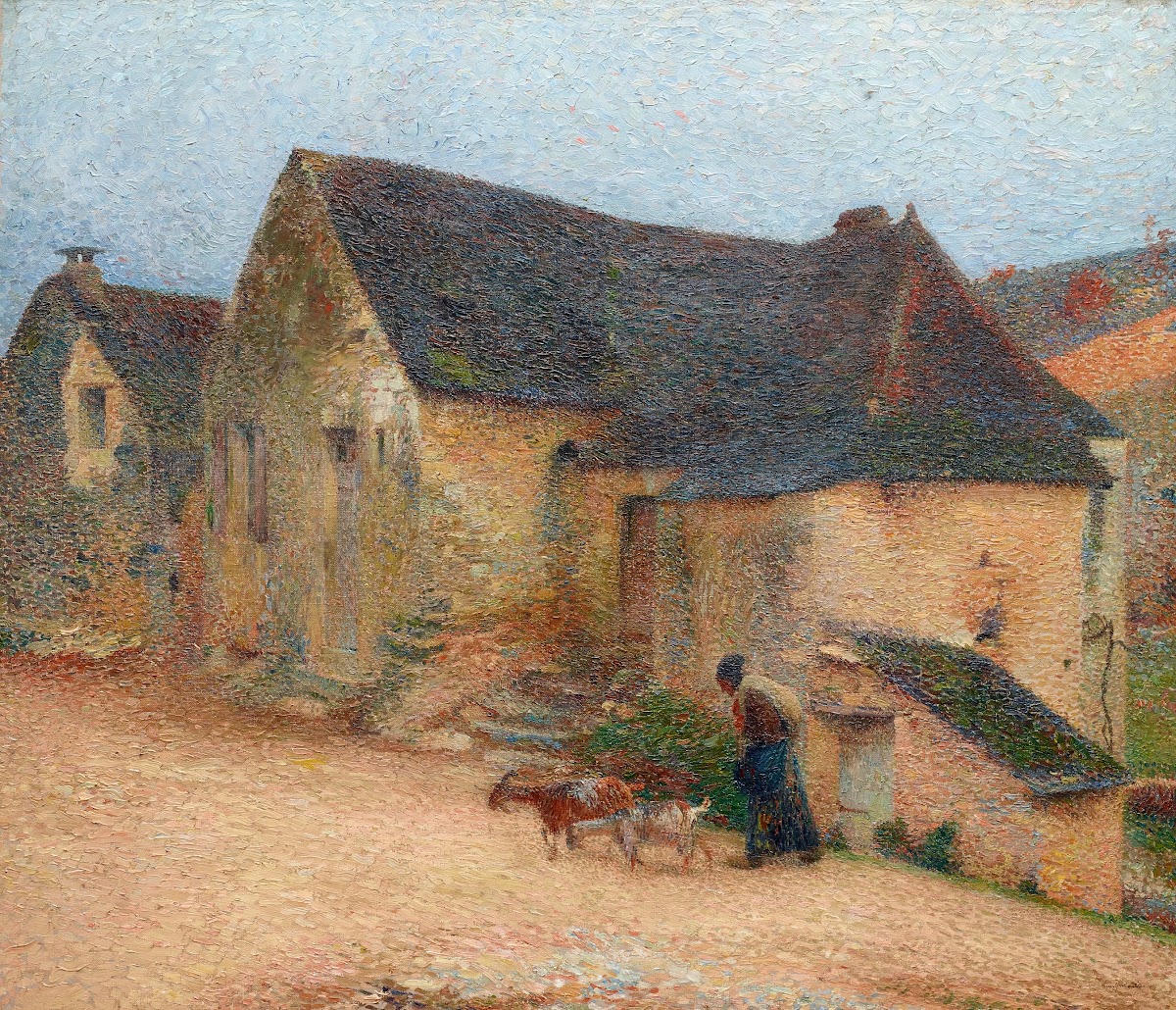 Chevrière devant une vieille maison à Labastide