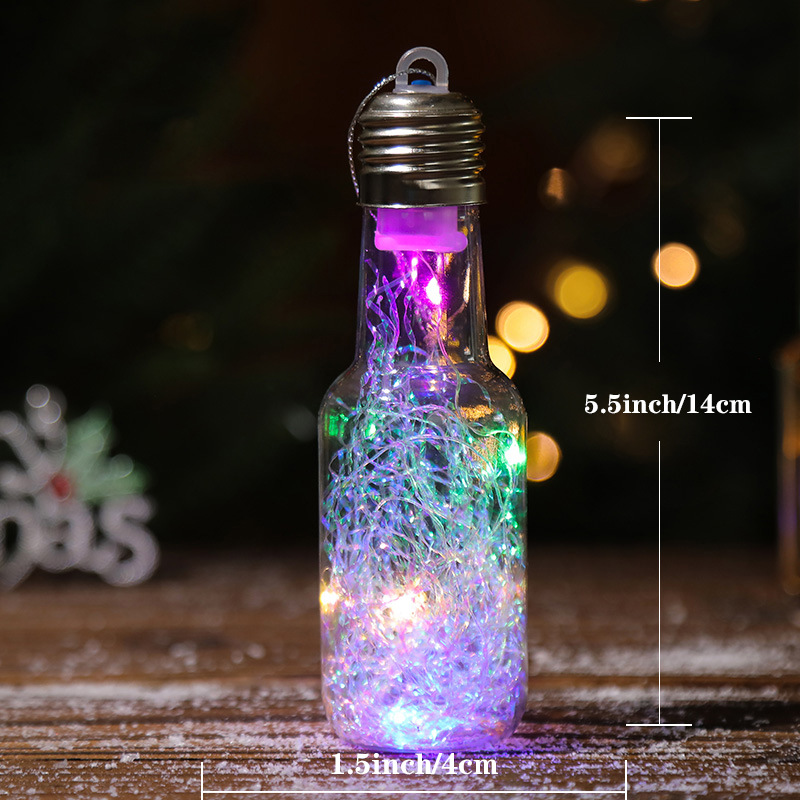 Lit wooden Christmas house for table decoration