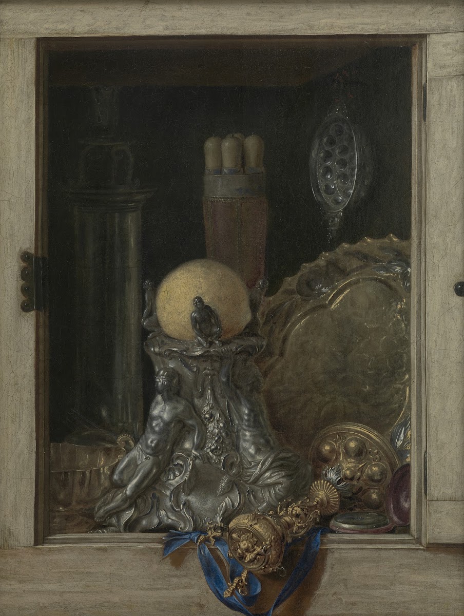 Silverware in an Open Cabinet