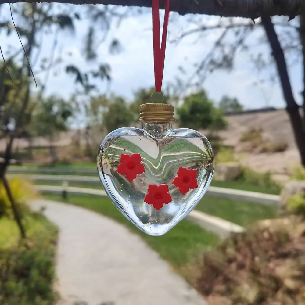 Hanging bird bath with flower design