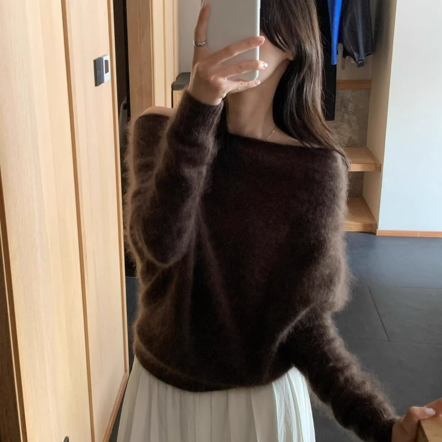 Women's knitted sweater with boat neckline, loose