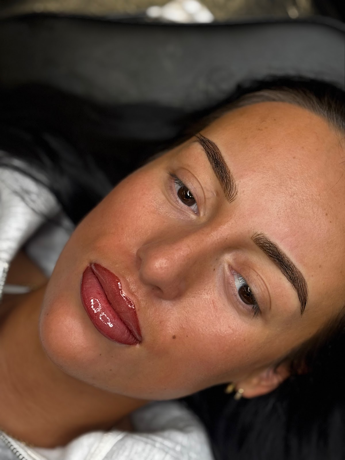Combination brow permanent makeup — hair strokes and powder shading