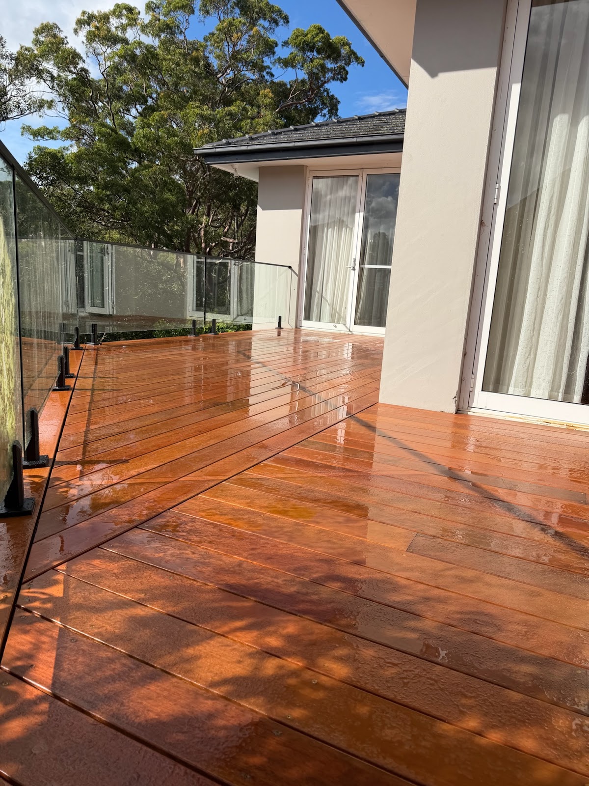 Modern balcony deck with glass railings