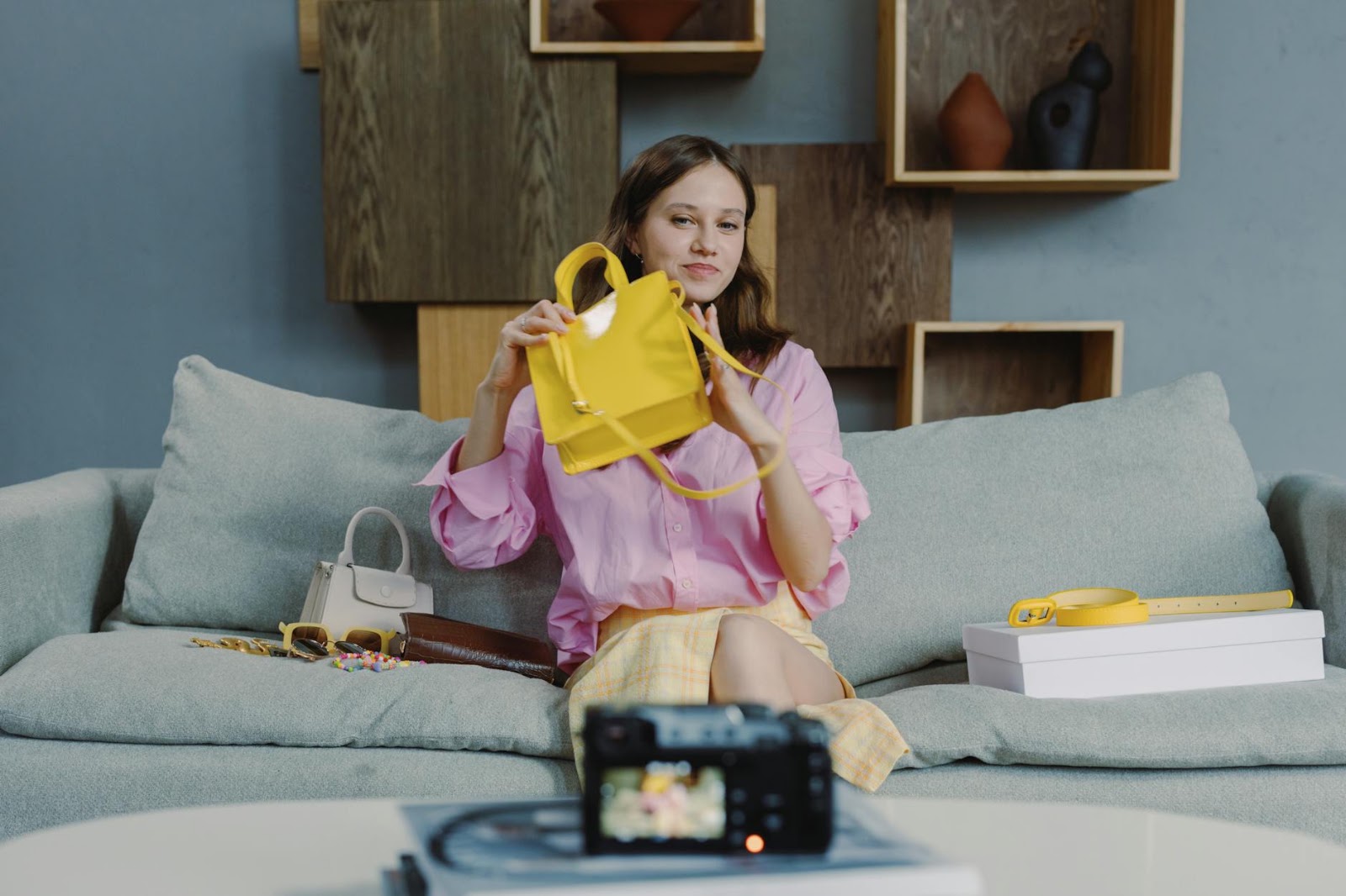 A virtual influencer showcasing a product in a futuristic live social shopping environment