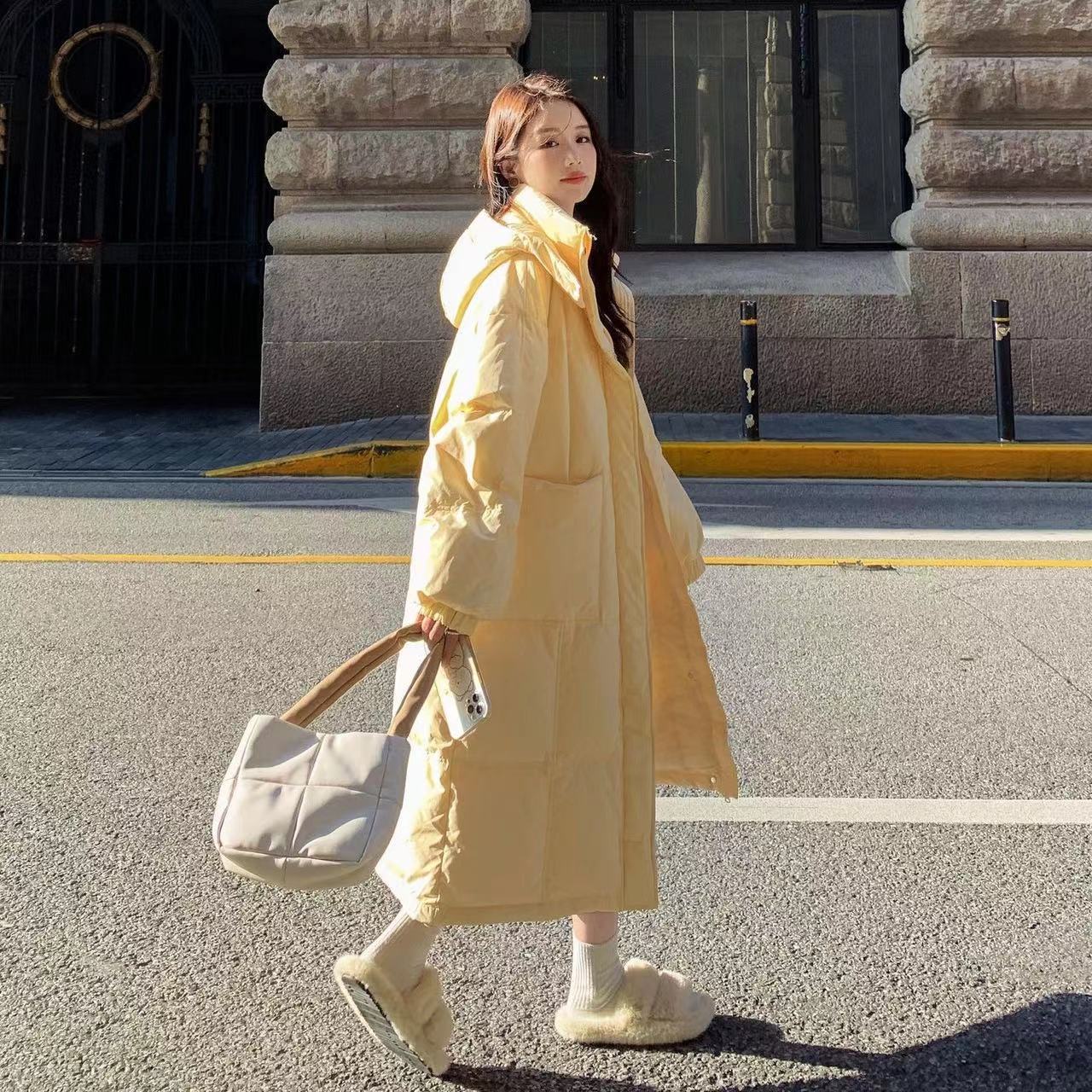 Long women's winter jacket with hood