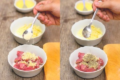 Ướp thịt bò với tỏi, 1/3 muỗng cà phê hạt nêm MAGGI, tiêu và ít dầu ăn trong 10 phút để thịt thấm.