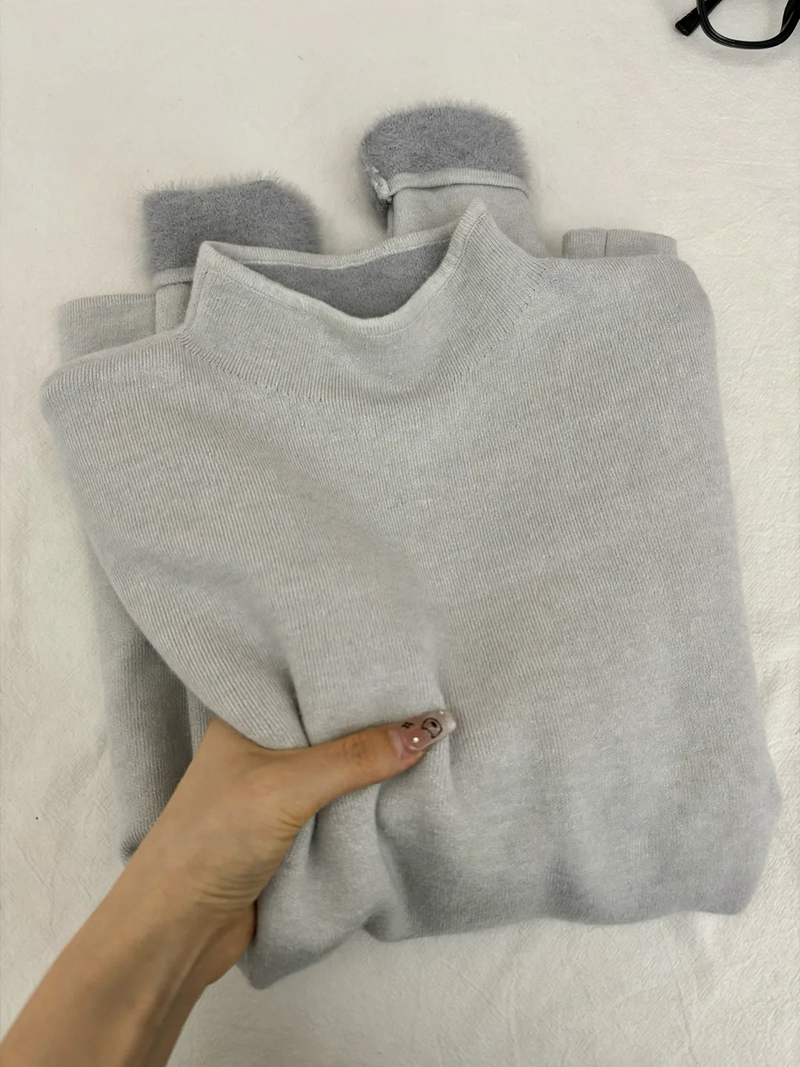Women's knitted sweater with a stand collar, lined