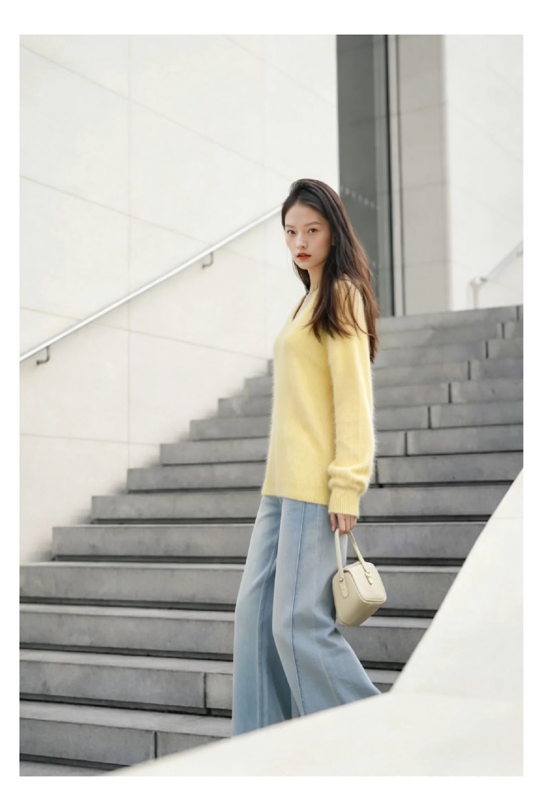 Women's knitted sweater made from a wool blend with a V-neck