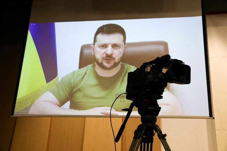 Ukrainian President Volodymyr Zelenskiy addresses South Korean parliament via video link at National Assembly in Seoul, South Korea April 11, 2022.