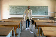 Seth Mazibuko, a student leader from the class of 1976,  in a classroom at his old high school, Phefeni Secondary School, on Vilakazi Street in Soweto. 