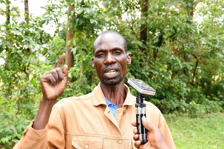 Farmer Peter Opuko complains of high seed prices