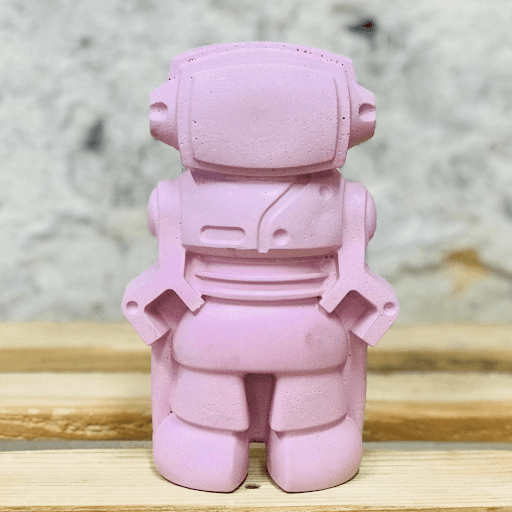 robot en béton de couleur rose pastel pour chambre d'enfant