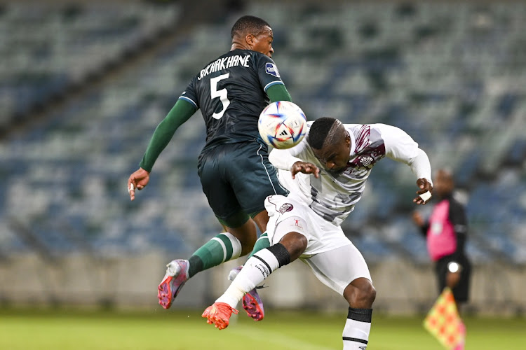 Thembela Sikhakhane of AmaZulu FC and Kagiso Malinga of Swallows FC during the DStv Premiership match between AmaZulu FC and Swallows FC at Moses Mabhida Stadium on April 01, 2023 in Durban, South Africa.