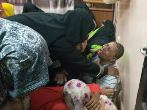 Salma Abdalla, the mother of the slain youth, Shee Hassan being condoled at her home, January 29, 2019./ Ernest Cornel