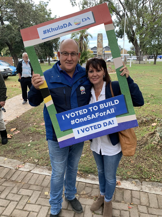 Former mayor Athol Trollip cast his vote at the Walmer town hall along with his wife Janine