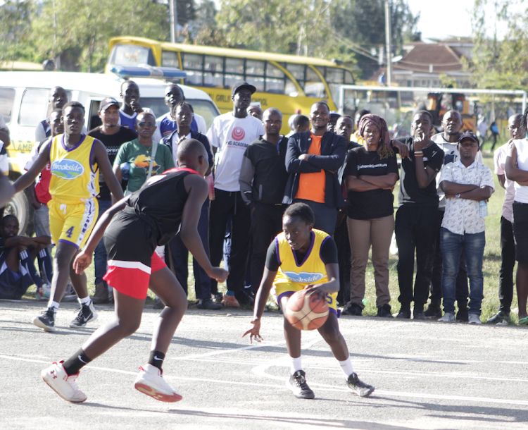 Butere and Nyakach in action during their opening girls' basketball match