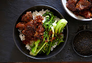 Asian pork neck with jasmin rice and greens.
