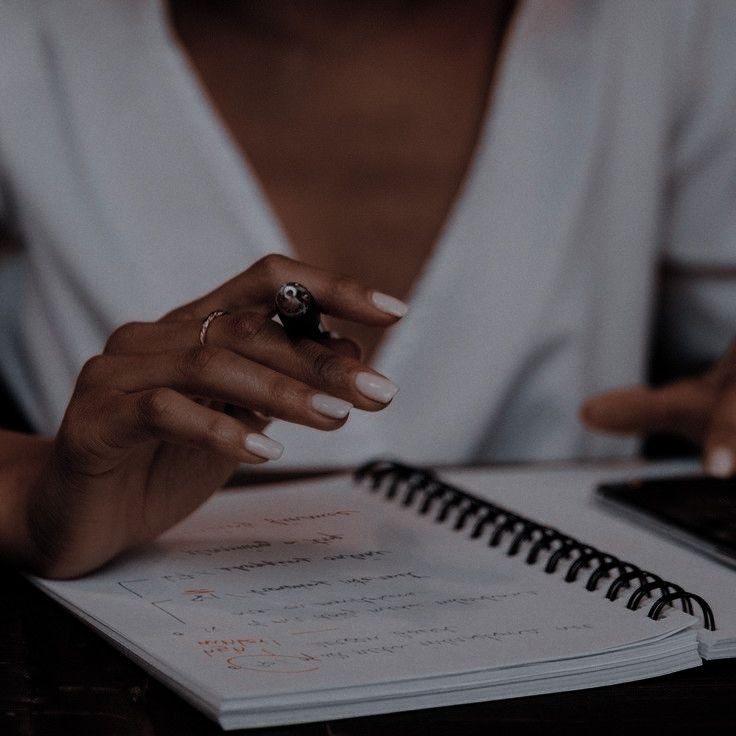 Person wears a ring in middle finger