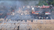 Drone footage shows smoke rising from the spot after a massive fire broke out in an inland container depot at Sitakunda, near the port city Chittagong, Bangladesh, on June 5, 2022 in this still image obtained from a handout video.  