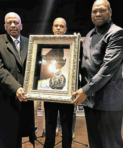 SPEAKING OUT: At Ace Ncobo's book launch at UFH's Miriam Makeba Centre in East London are ANC presidential hopeful Mathews Phosa, Ncobo and ANC treasurer-general Zweli Mkhize Picture: ZINGISA MVUVU