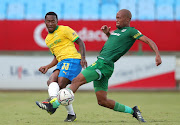 Lebohang Maboe of Mamelodi Sundowns challenged by Goodman Mosele of Baroka during the DStv Premiership match between Mamelodi Sundowns and Baroka FC at Loftus Versfeld Stadium on February 17, 2021 in Pretoria, South Africa.