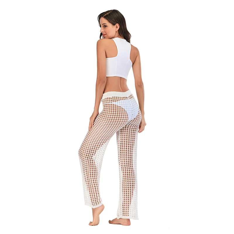 Calças de perna larga de malha soltas, sexy e elegantes para praia. Desfrute do conforto casual e do estilo chique. Ideal para dias ensolarados e relaxantes.