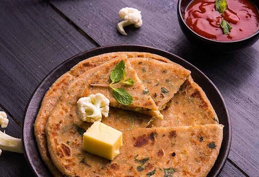 Paneer Paratha With Raita And Butter