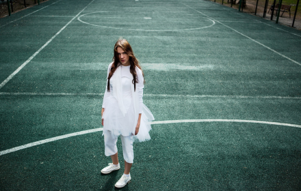 Girl on the soccer field small promo image