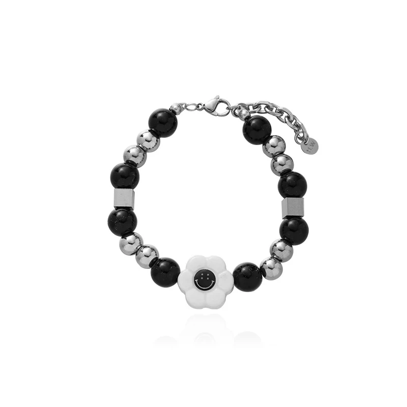 Bracelet homme tendance country en acier titane, tournesol, marguerite et perle. Un accessoire masculin élégant et original.