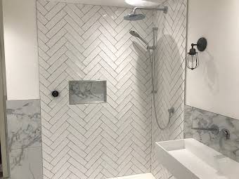 Herringbone shower area with recess shelf  album cover