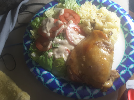 Pollo al Horno with green salad and rice.