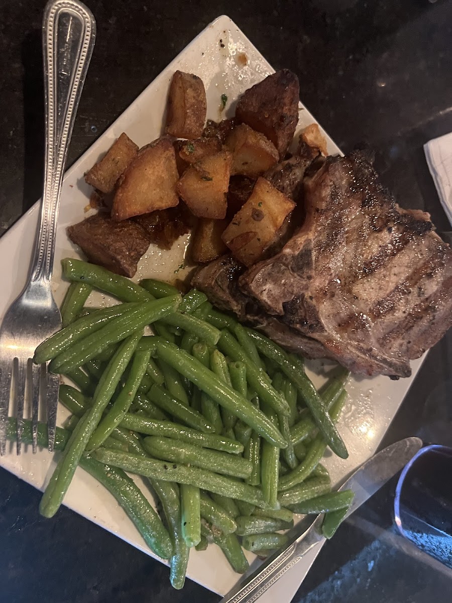 Grilled Pork chops, Sautéed Green Beans, Fried Garlic Potatoes