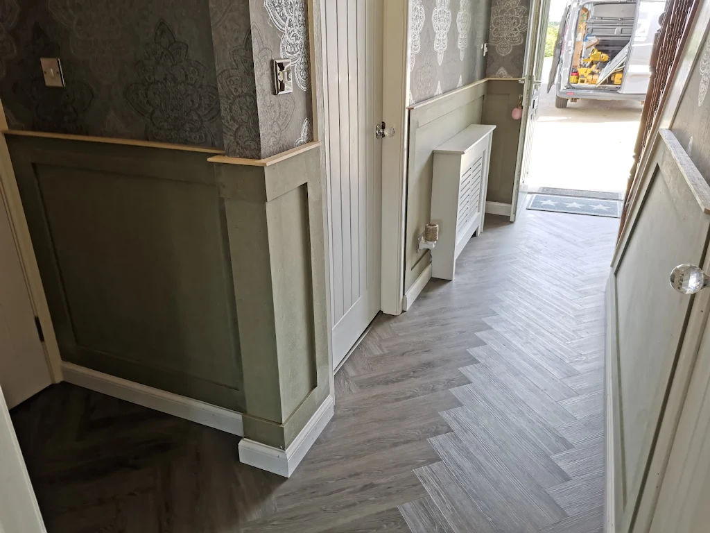 Album cover: Herringbone Vinyl flooring / Doors / Wall panelling 