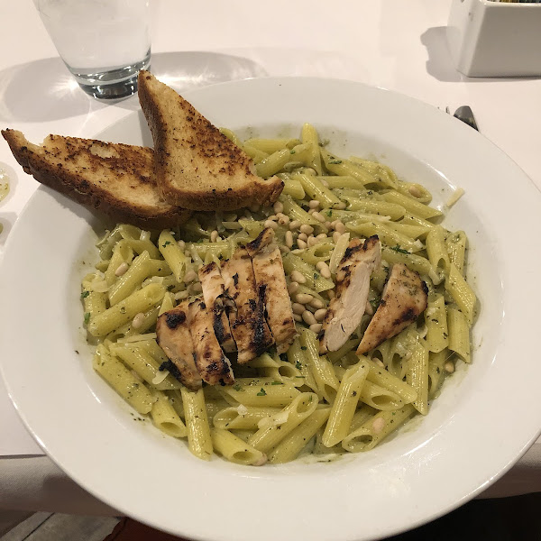 Pesto pasta with chicken and garlic toast. Huge portion!