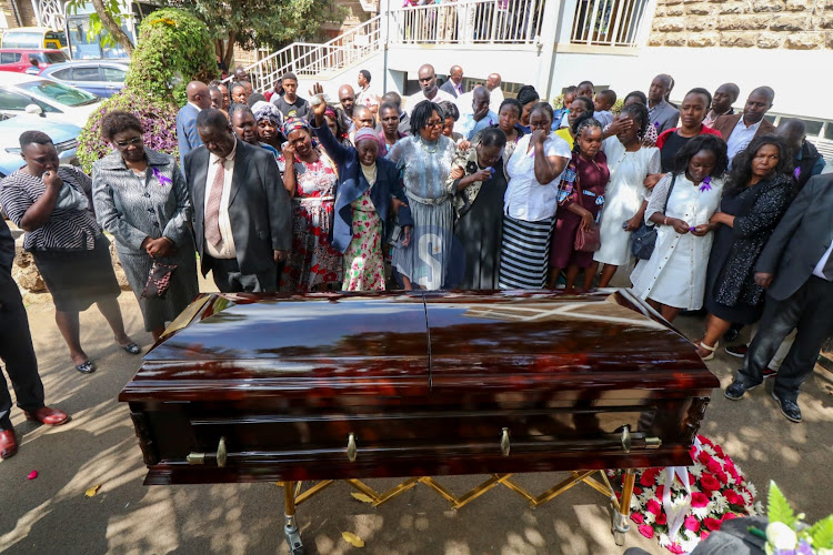 Family and friends of the former Commissioner General of Kenya Prisons Isaiah Mosiori Osugo at Maxwell SDA on January 17.