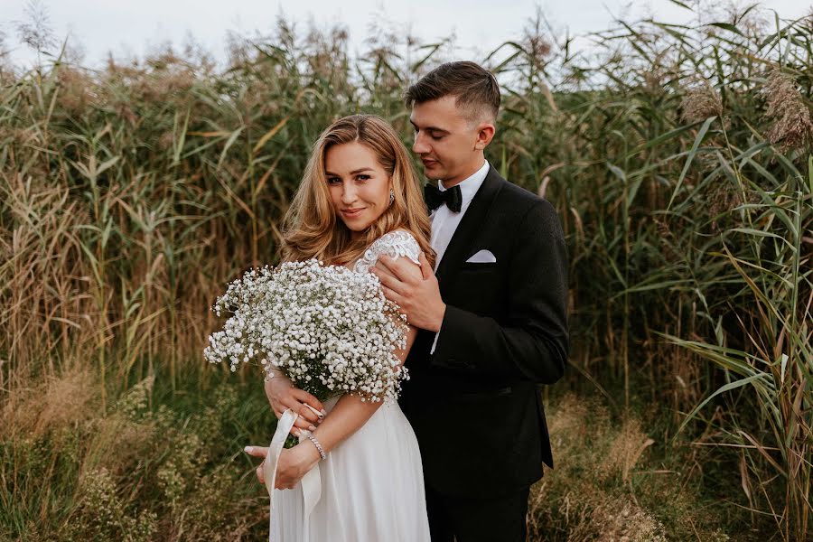 Fotógrafo de casamento Łukasz Styczeń (dreampicture). Foto de 12 de maio 2022