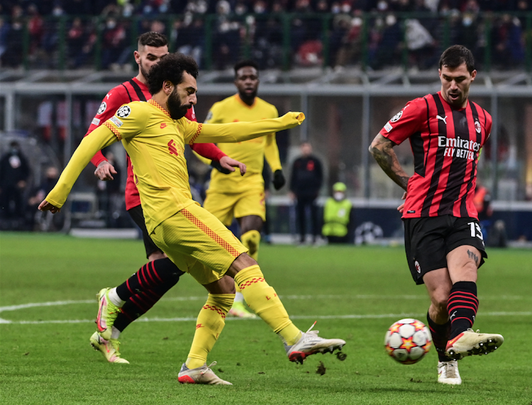 Liverpool forward Mohamed Salah shoots on target during a UEFA Champions League Group B match against AC Milan at the San Siro Stadium in Milan on December 7