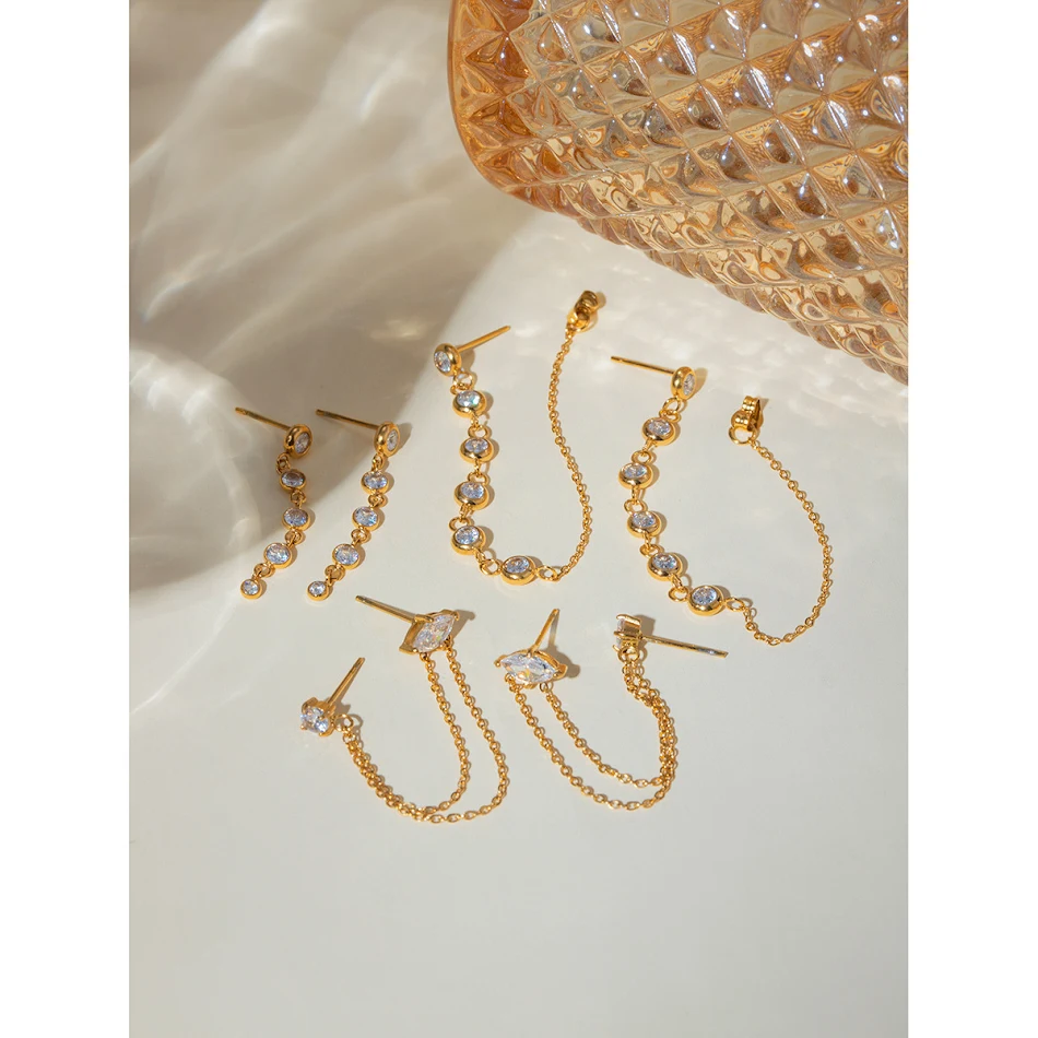 Boucles d'oreilles rondes en acier inoxydable doré 18 carats avec zircon et pompon – Élégance et sophistication assurées