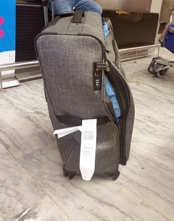 Joburg businesswoman's brand new R4,000 luggage bag was ripped apart by airport staff.