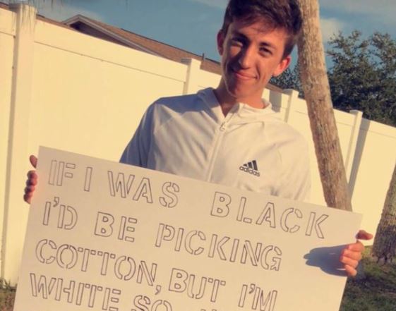 A Florida teenager has apologised for the sign he used to ask a girl to be his date.