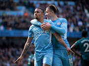 Gabriel Jesus of Manchester City celebrates scoring his second goal of four with teammate Jack Grealish in the Premier League match against Watford at Etihad Stadium in Manchester on April 23 2022.